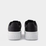 Baskets B-court en Cuir Noir et Blanc