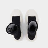 Baskets Tread Slick en Toile Noire & Blanche