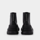 Baskets Tread Slick en Cuir Noir & Argent