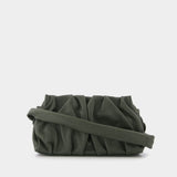 Sac Vague en Cuir Vert et Surpiqure Blanche