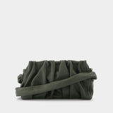 Sac Vague en Cuir Vert et Surpiqure Blanche