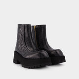 Bottines Zippées en Cuir Noir