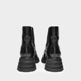 Bottines Upper and Ru en Cuir Noir