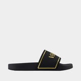 Slides Rubber Embossing Versace - Versace - Synthétique - Noir