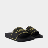 Slides Rubber Embossing Versace - Versace - Synthétique - Noir