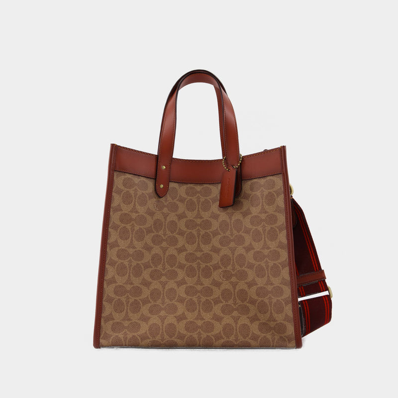 Sac Signature Carriage Field Tote en Toile Enduite, Marron