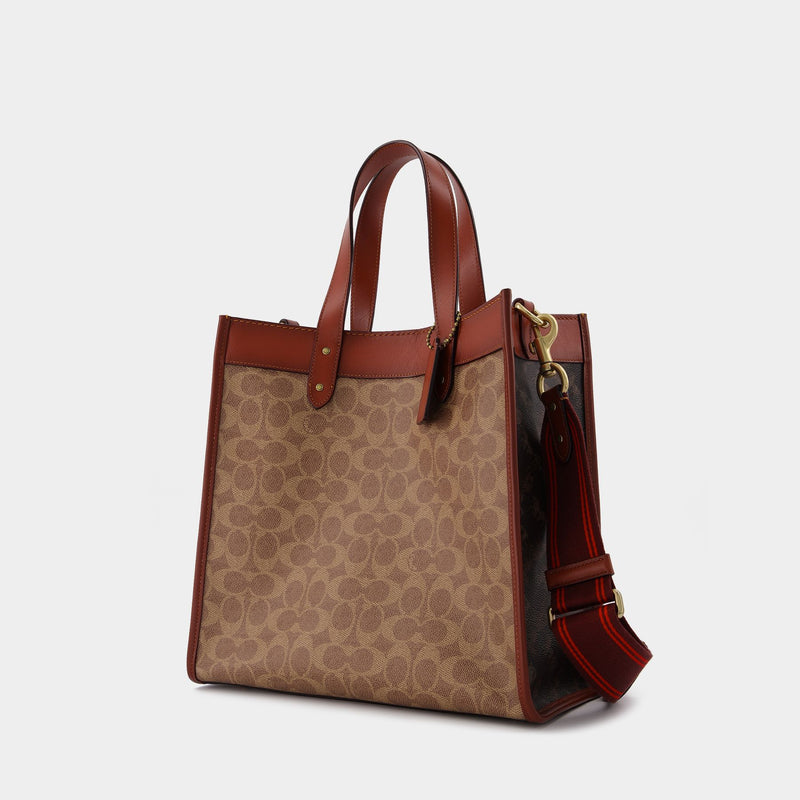 Sac Signature Carriage Field Tote en Toile Enduite, Marron