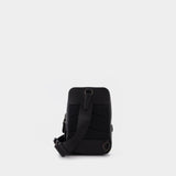 Sac Signature Gotham Sling Pack 13 en Toile Enduite Noire