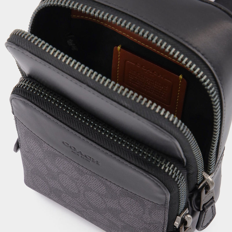 Sac Signature Gotham Sling Pack 13 en Toile Enduite Noire