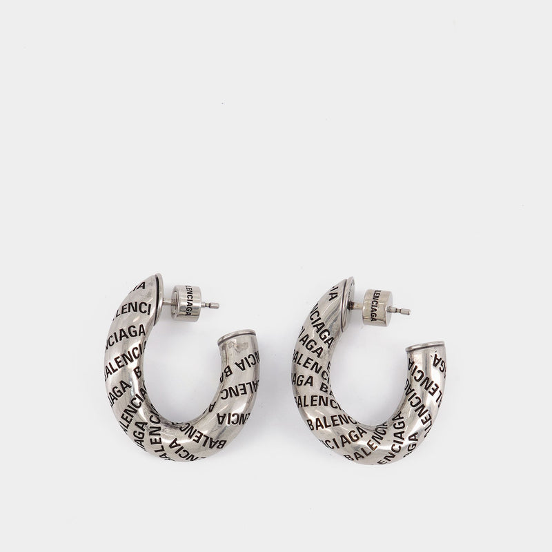 Boucles d'Oreilles Logo en Laiton Argenté